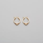 14K Gold hoops with graphic details reminiscent of lace. These Earrings are made of Fairmined Gold, extracted from Fair trade mines in Colombia and Peru. 