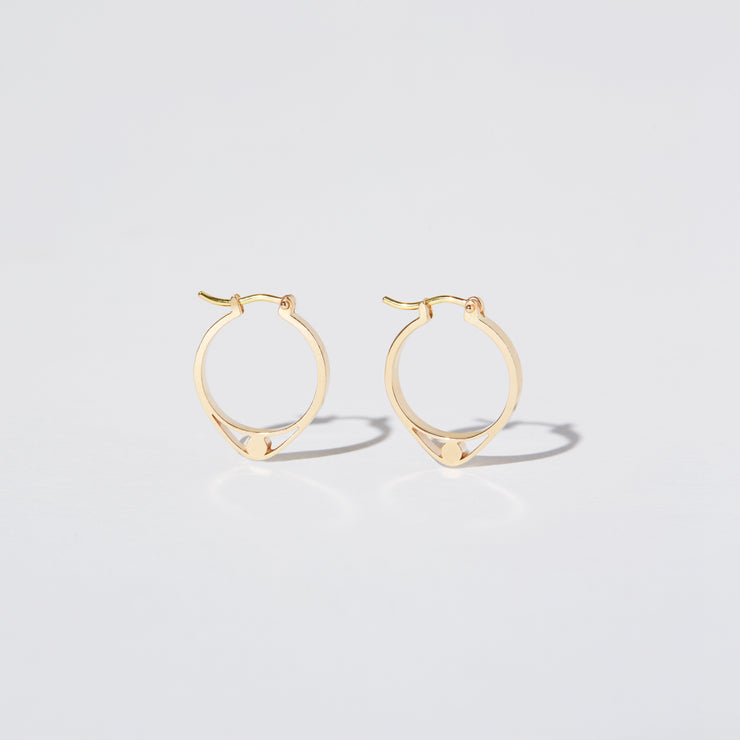 14K Gold hoops with graphic details reminiscent of lace. These Earrings are made of Fairmined Gold, extracted from Fair trade mines in Colombia and Peru.