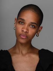 picture of model with ear gem cuff and gem hoops