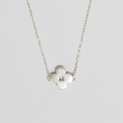 sterling silver necklace of a silver clover on fine chain