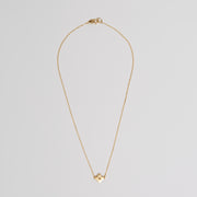 Gold plated sterling silver necklace of a golden clover on fine chain