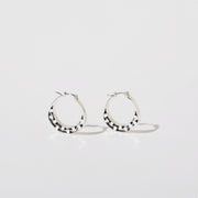 silver hoops with graphic details 