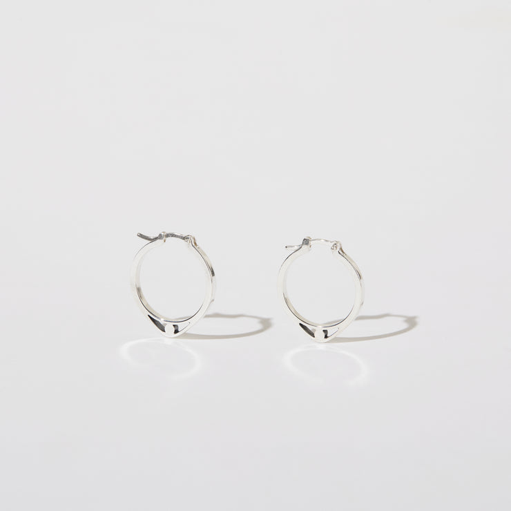 silver fine hoops with detail of an eye