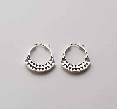 Silver hoops with graphic details 