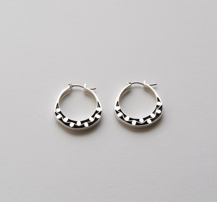 Silver hoops with graphic details 