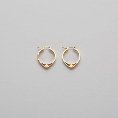 14K Gold hoops with graphic details reminiscent of lace. These Earrings are made of Fairmined Gold, extracted from Fair trade mines in Colombia and Peru. 