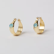 small brass hoops with chalcedony (light blue stone)